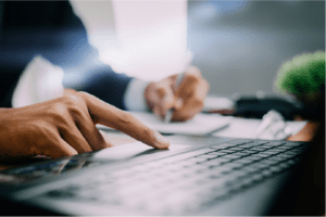 man type on laptop